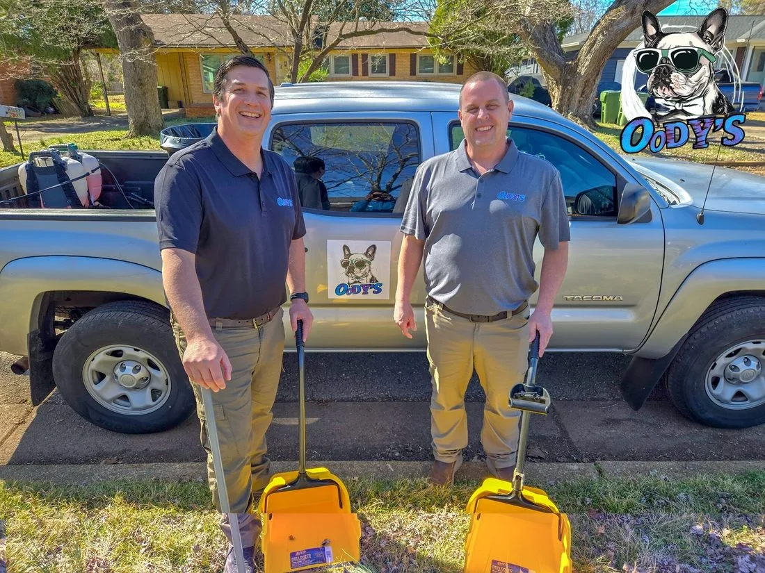 Chris, owner of Oody's Pet Waste Removal, with his crew
